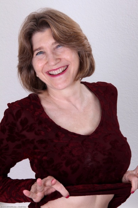 mature undressing top picture