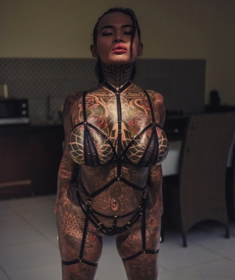 big pierced tits top image