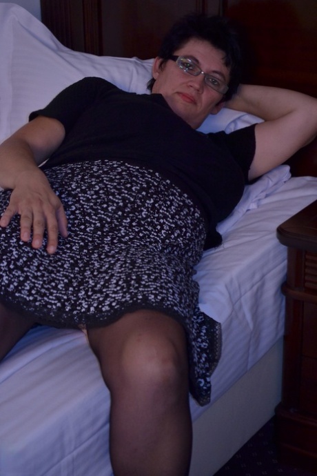 mature glasses pornographic picture